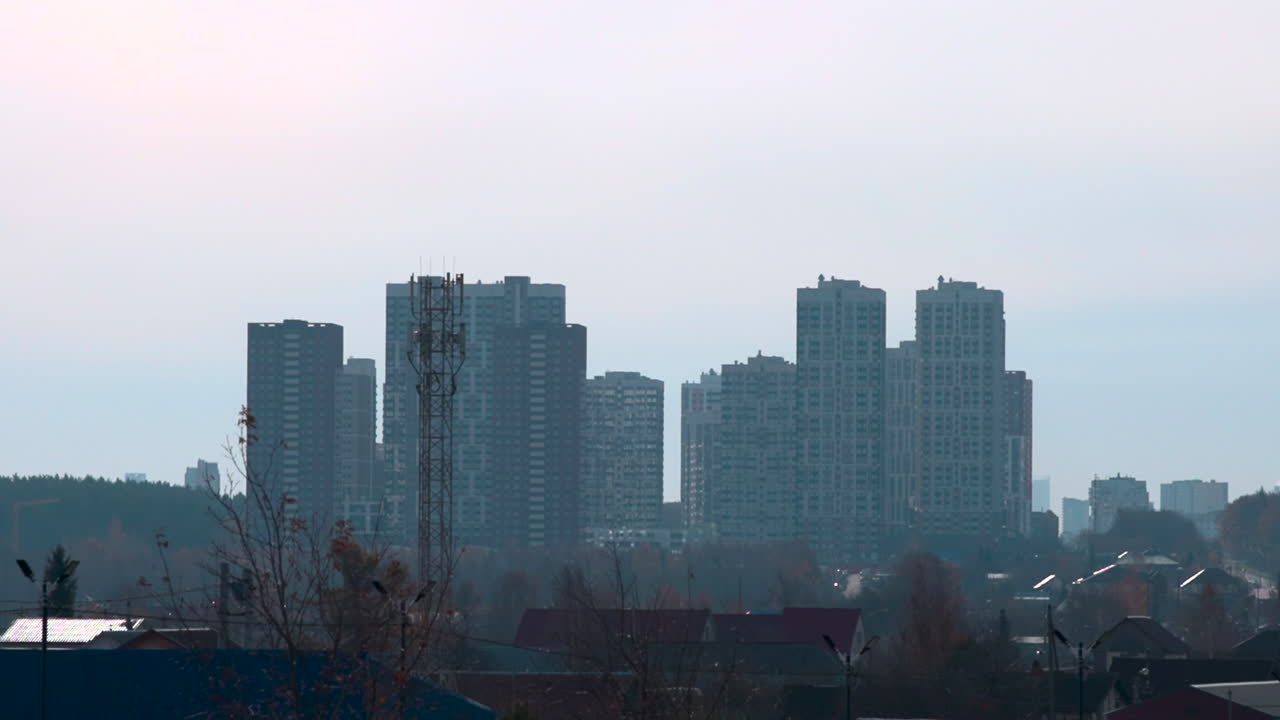 Cityscape with Modern Buildings and Telecommunication Tower