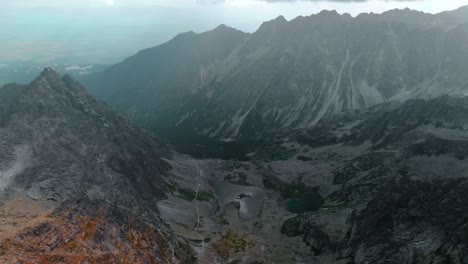 AERIAL-Mountain-range-view-with-multiple-lakes-and-epic-landscape