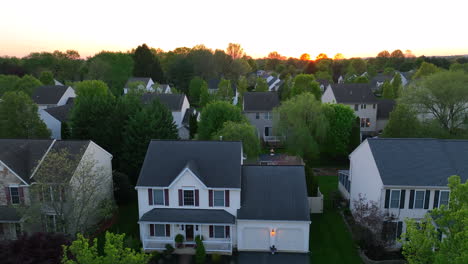 aerial rising shot of one family home