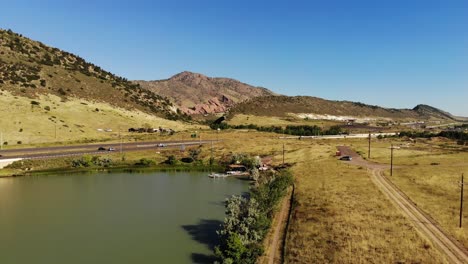 A-drone-shot-over-a-water-ski-lake,-Morrison-Co