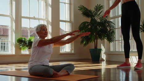 senior woman yoga training session