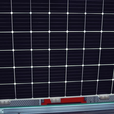 production of solar panels. automated equipment at work inside the modern industrial plant. close-up.