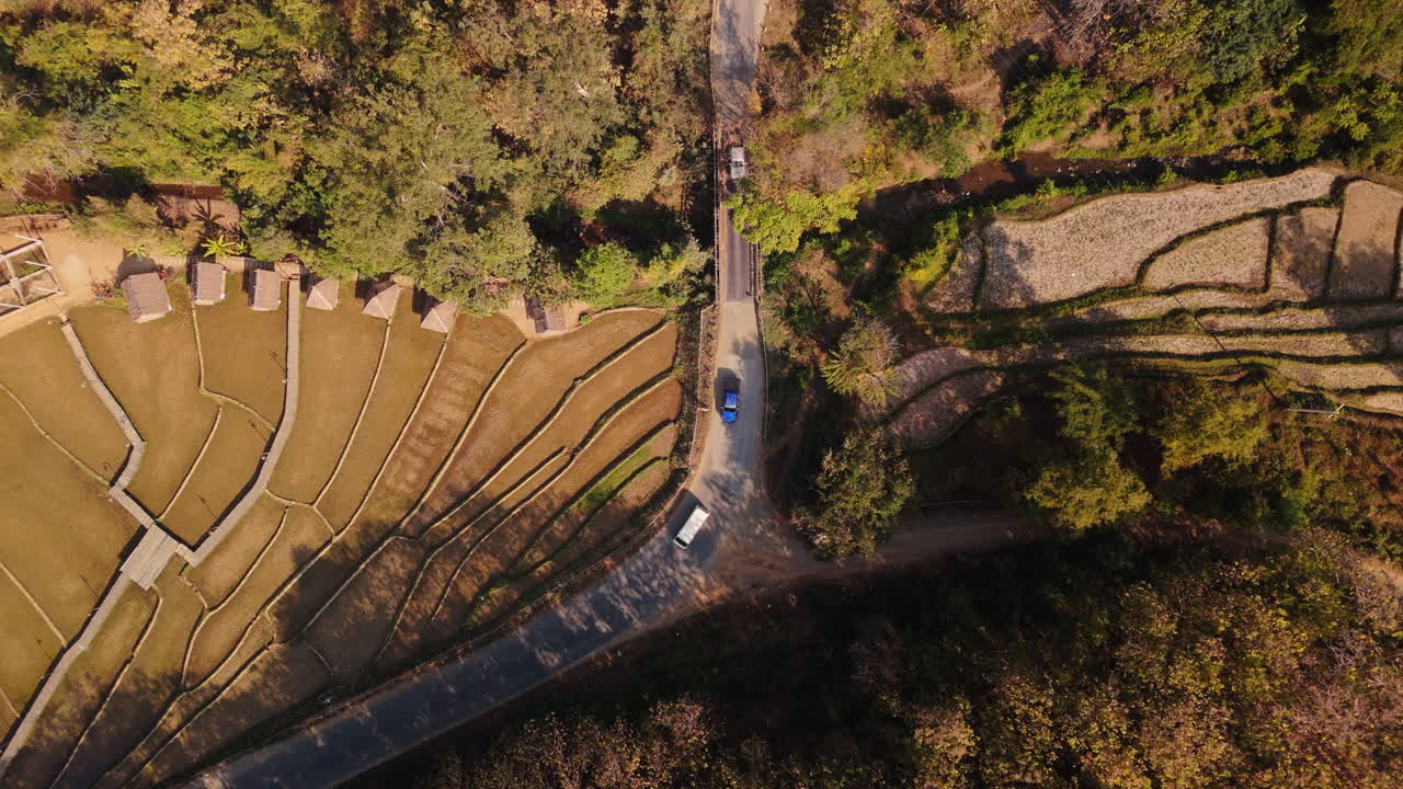 Aerial View of Terraced Rice Paddies and Country Road
