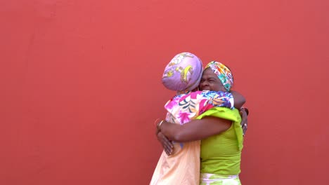 Hispanic-women-meeting-on-street