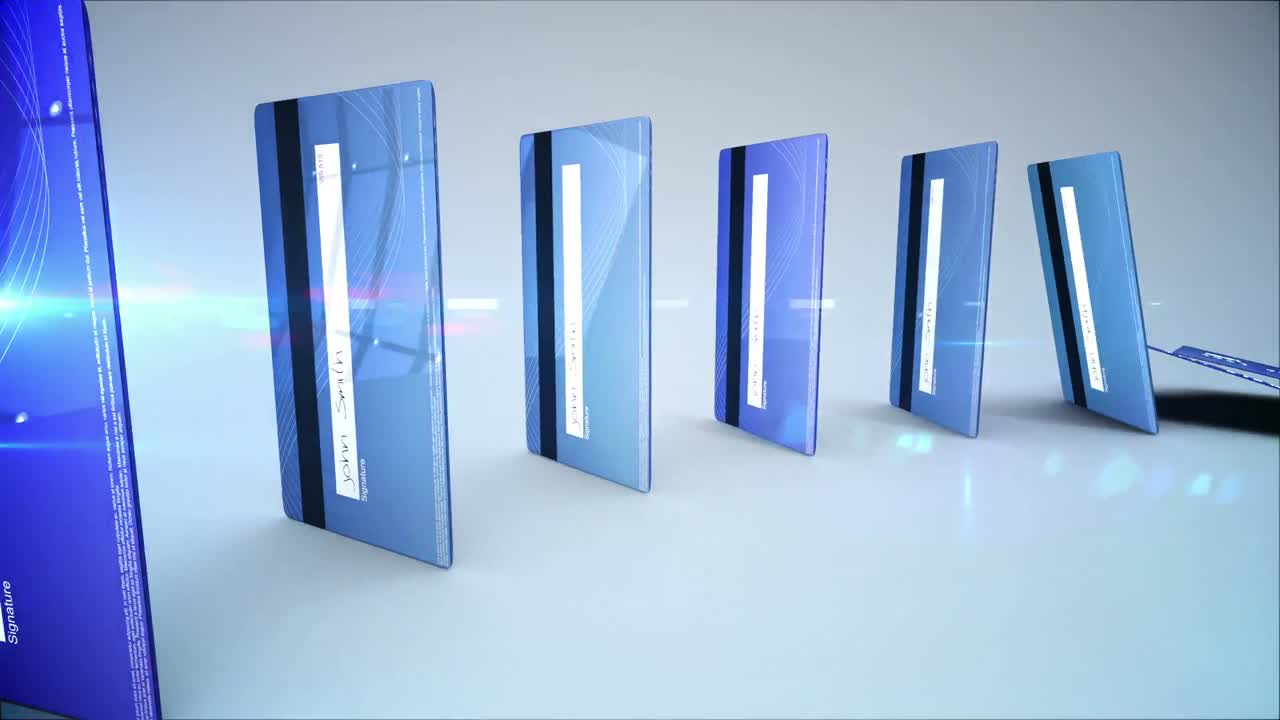 Blue credit cards falling in a circle like dominoes
