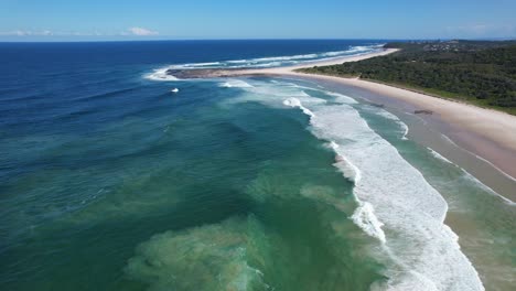 Turquoise-Seascape-At-Sharpes-Beach-In-New-South-Wales,-Australia---aerial-drone-shot