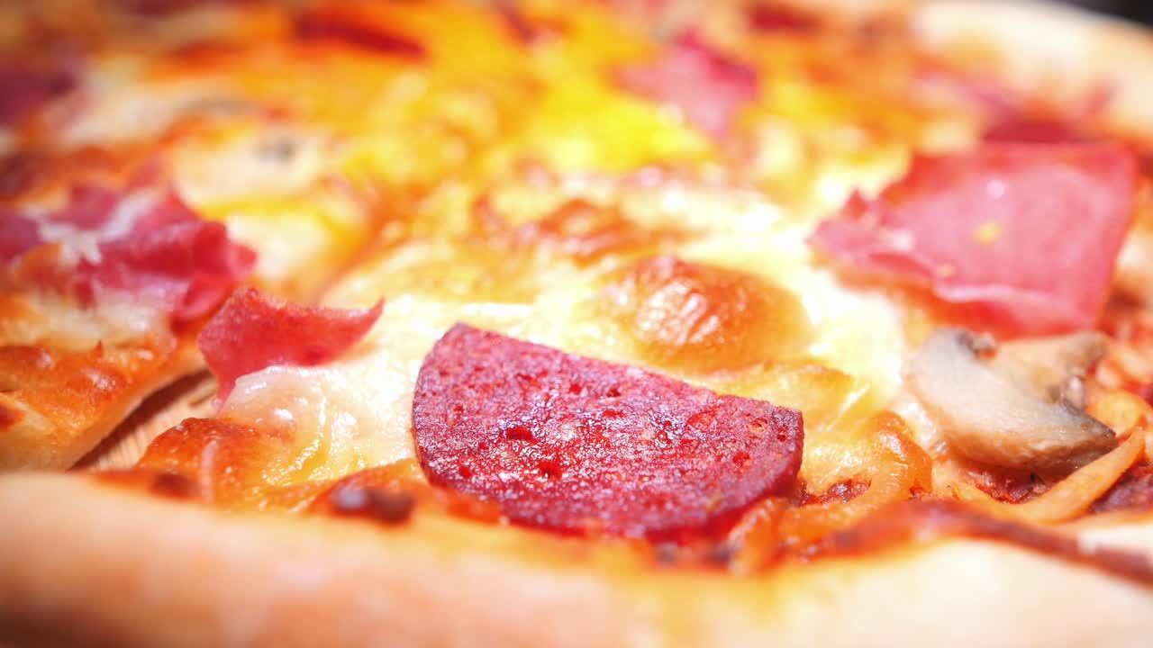 Close-up view of a loaded pizza