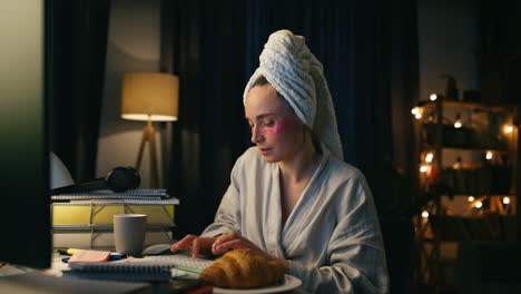 Focused-woman-texting-computer-at-flat-closeup.-Lady-listening-music-browsing