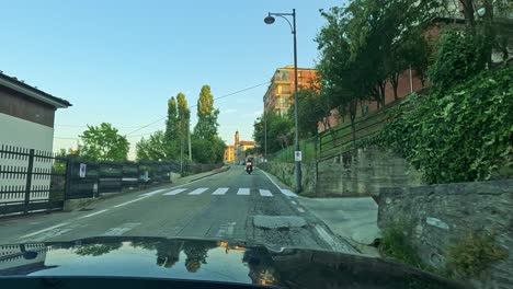 driving through vineyards in cuneo, italy