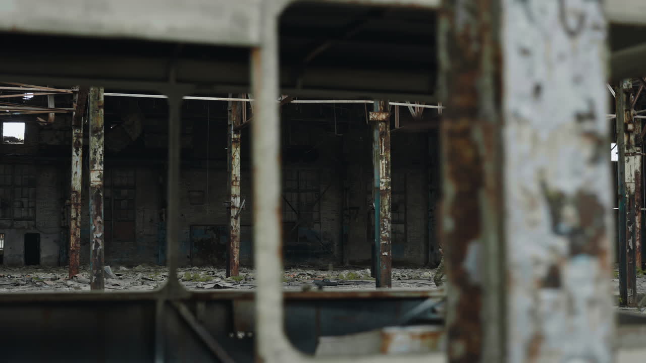 Military Personnel in a Damaged Factory