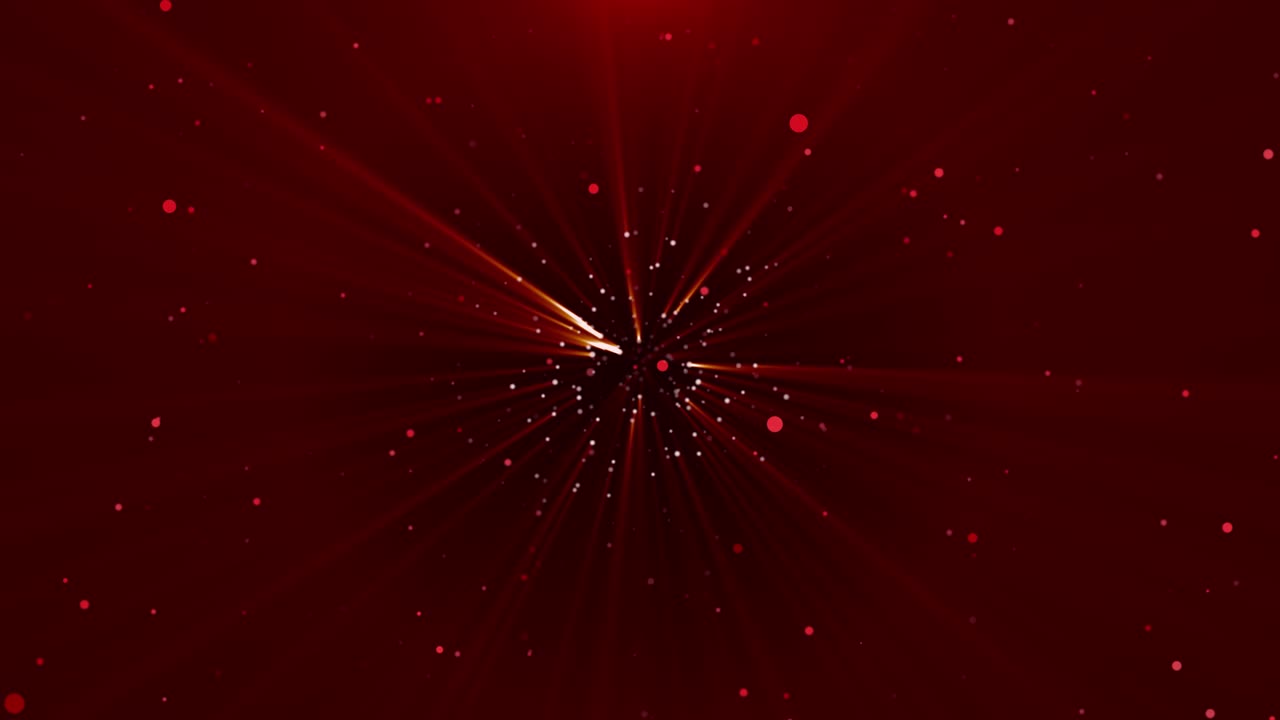 Red glitter particles sparkle background of red light rays christmas valentine particles at an
