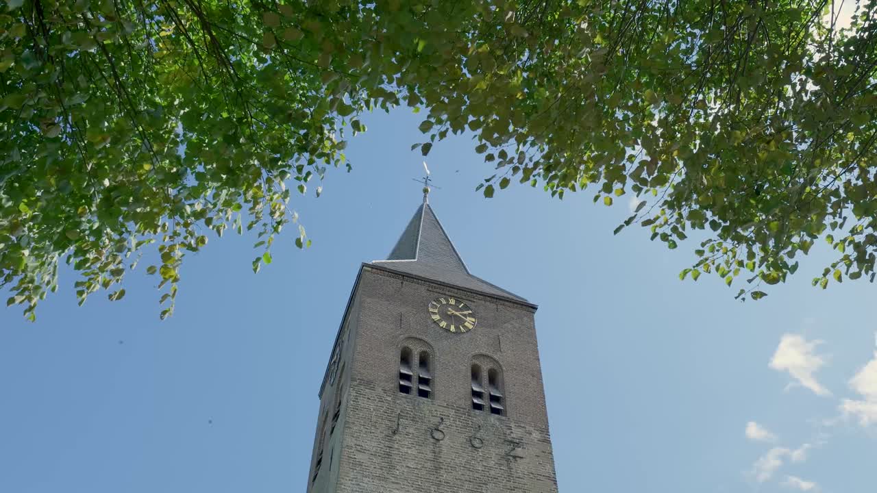 Clock Tower against Blue Sky