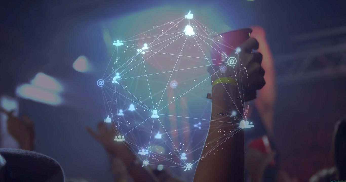 Woman raising red cup in club celebrating, initiating rotating digital network showing social icons
