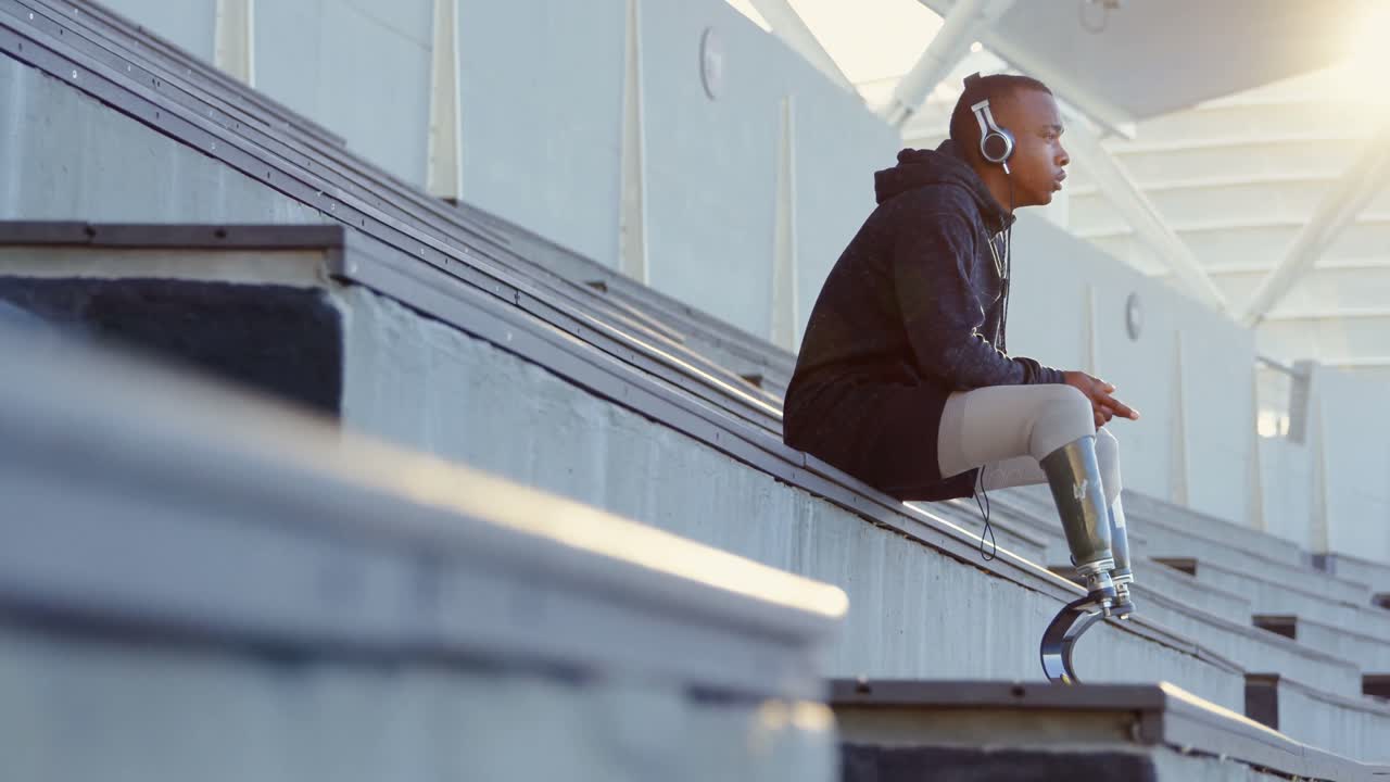 Disabled athletic sitting at sports venue 4k