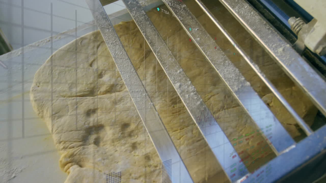 Processing dough, industrial machine with metal blades in bakery, animation used