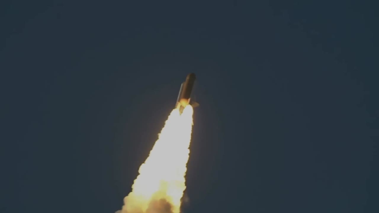 Space Shuttle moving into the sky with smoke trails