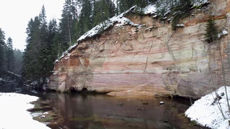 aerial drone view of suur taevaskoda sandy outcrops in estonia during winter