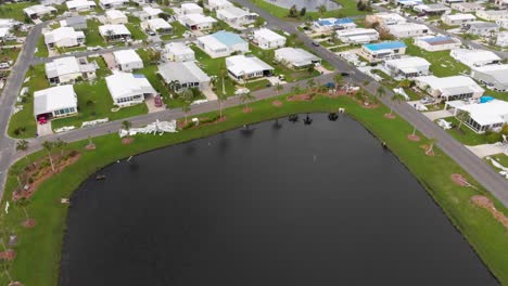 4K-Drone-Video-of-Roof-Tarps-on-Mobile-Homes-Damaged-by-Hurricane-Ian-in-North-Port,-Florida---27