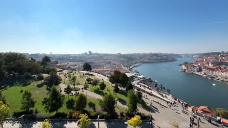 panoramic view of jardim do morro gardens in porto in portugal on a sunny day with people walking