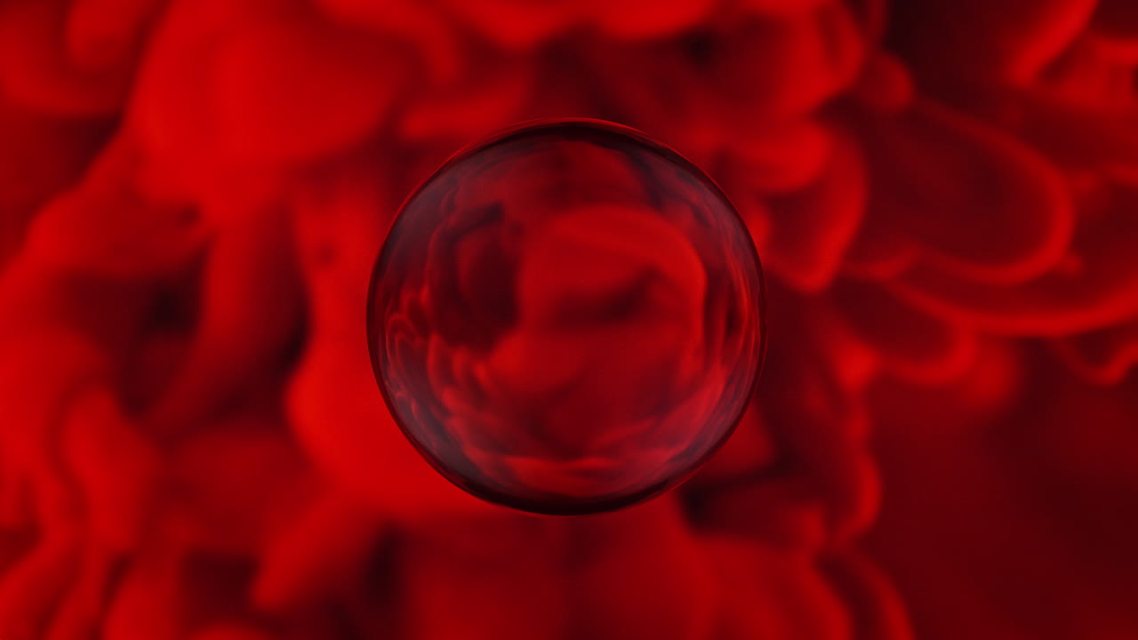 Swirling Patterns Of Red Ink Through The Prism Of A Glass Sphere, Liquid Smoke in a Marble, Macro and Slow Motion