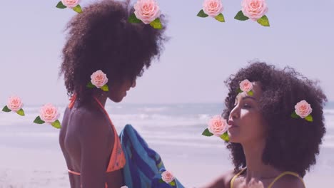 animación de flores sobre una feliz madre afroamericana con su hija en una playa soleada