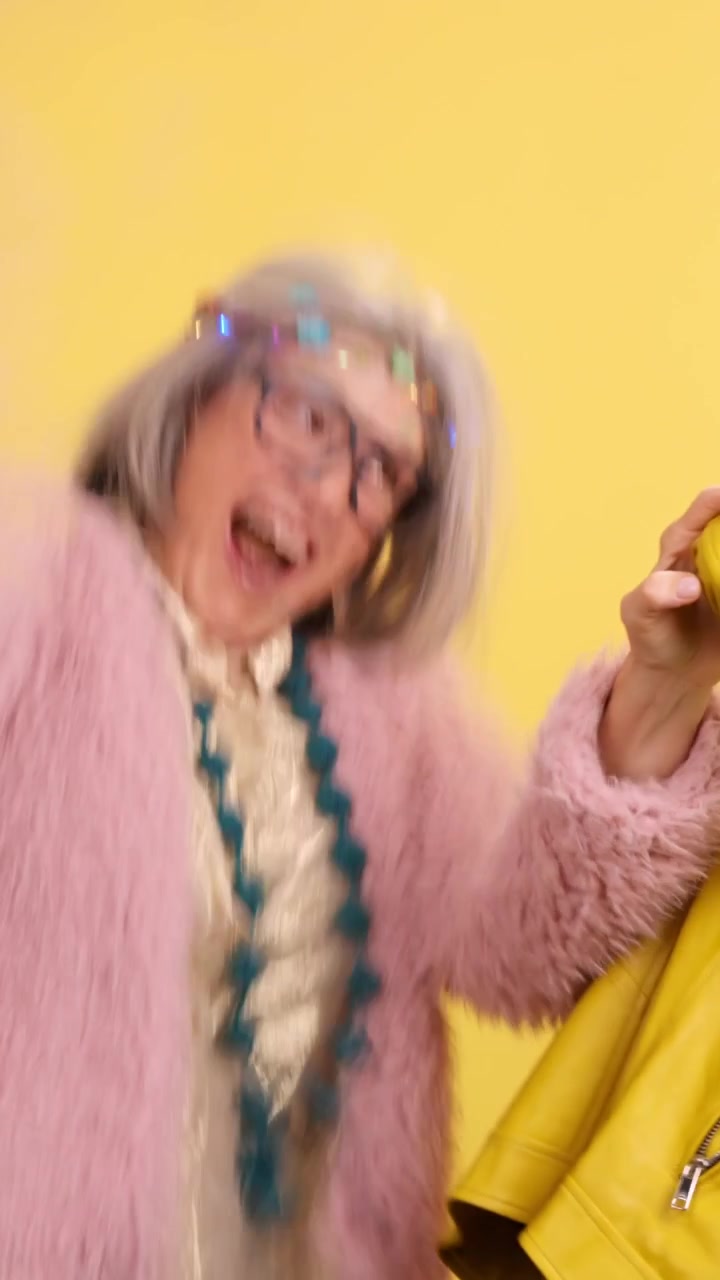 Playful senior couple having a balloon fight