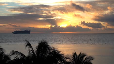 Cruise-ship-approaching-the-coast-at-dawn