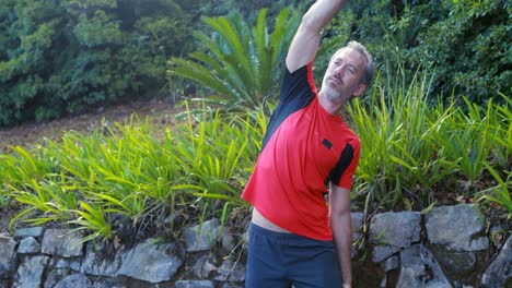 Man-exercising-in-forest