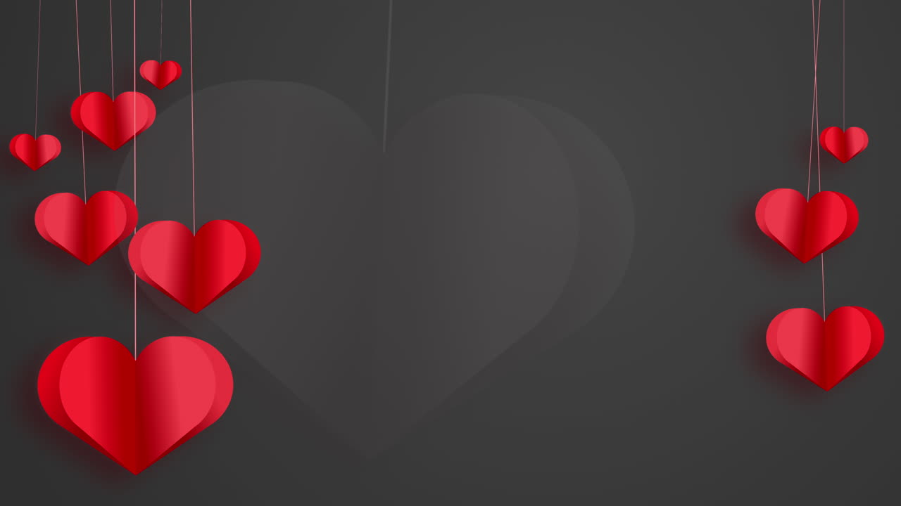 Paper hearts on a string sway in the wind. Animated romantic dark grey background with love symbols.