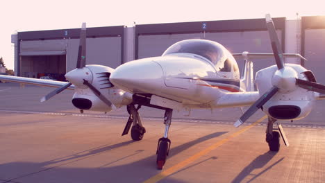 small airplane parked in airport. private airplane at airport parking place