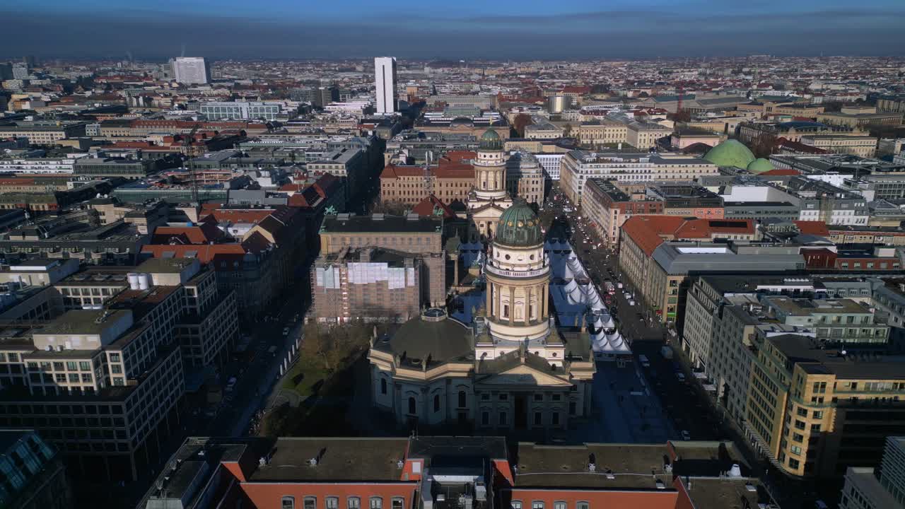 Christmas market tents and historic buildings in Berlin Gendarmenmarkt. speed ramp hyper motion time lapse Nice aerial view panorama orbit drone