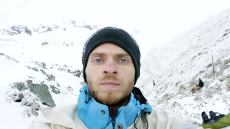 man in the mountains of nepal. manaslu circuit trek, larke pass, 5100m altitude.