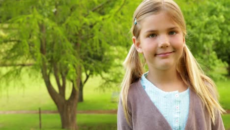 Cute-little-girl-smiling-and-waving