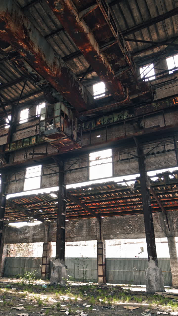 Abandoned ruined industrial factory building, ruins and demolition concept Vertical video