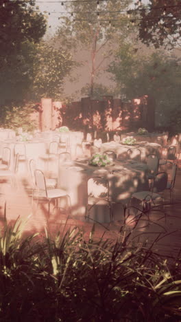 outdoor wedding reception with white tablecloths and string lights