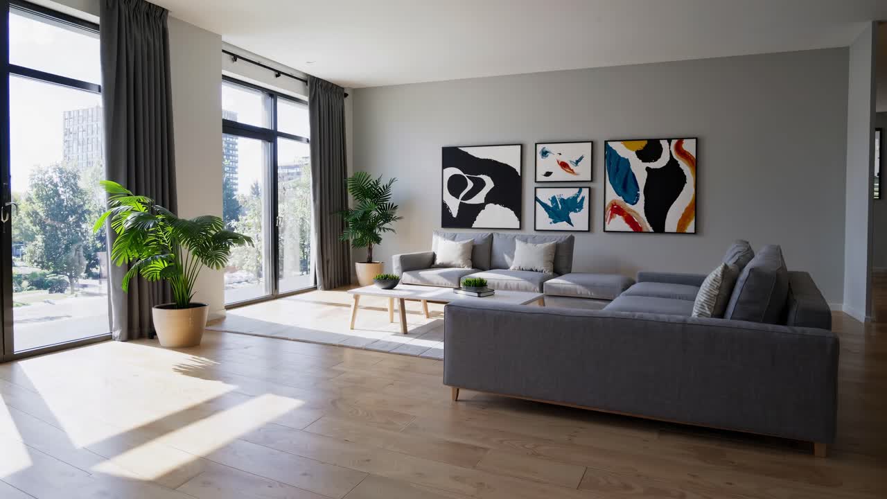 Soggiorno moderno con arte astratta, grandi finestre e divano grigio