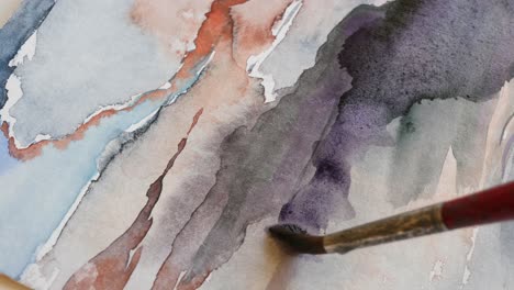 Loose-watercolor-brushstroke-on-abstract-painting,-closeup