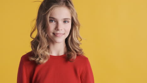 teenage caucasian girl posing in front of the camera.