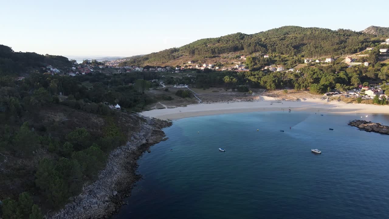 Aerial View of a Secluded Beach and Coastal Village