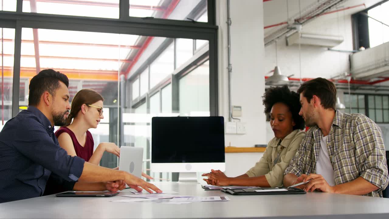 Business executives discussing during meeting