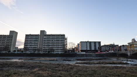 cityscape with buildings and a bridge