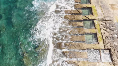 4k footage of a bird's-eye view of the baths of sliema in malta