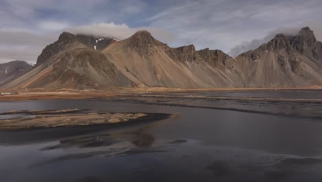 low tide on the coast of iceland. stokksnes peninsula with the vestrahorn mountains in the background. drone shot