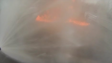 firefighters battle a raging chemical fire in a simulated airplane crash 9