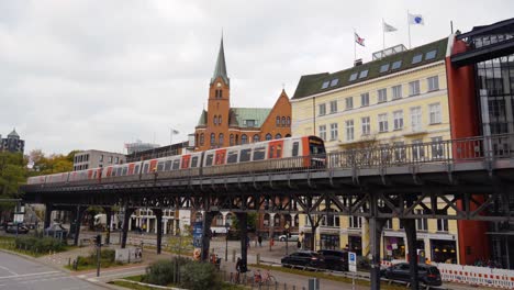 Metro-driving-in-Hamburg-city-with-buildings-in-background