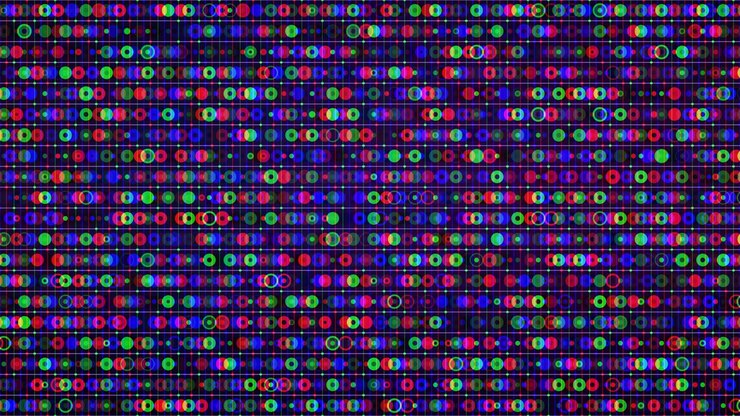 Vibrant red green and blue circles pulse across an RGB digital grid glitch in this seamless looping background