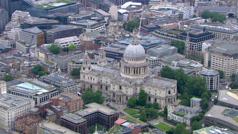 slow aerial zoom out shot of the famous st paul's cathedral in london