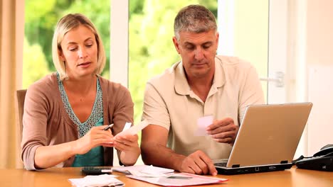 Couple-getting-worried-because-of-their-bills-