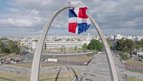 dominican national flag swaying with wind in santo domingo, dominican republic