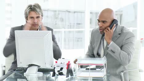 Frustrated-businessmen-at-work